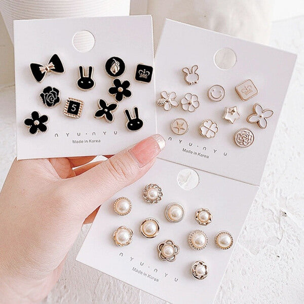 "Elegant dam brosch med zithinklegering och pärla, 1.5 cm, sofistikerad accessoar för att förhöja din stil."