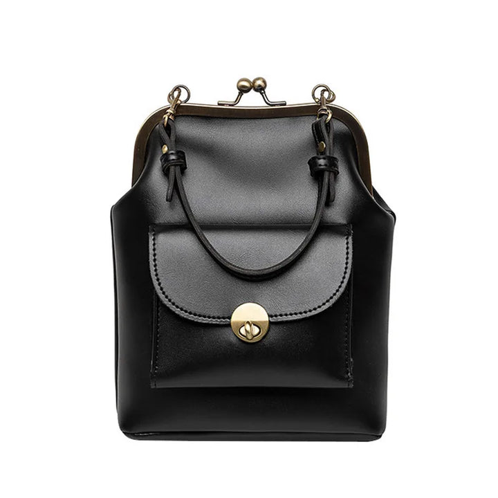 Elegant dam crossbody-väska i konstläder med stilren design, justerbar axelrem och klassiska färger som svart, kaki, burgundisk