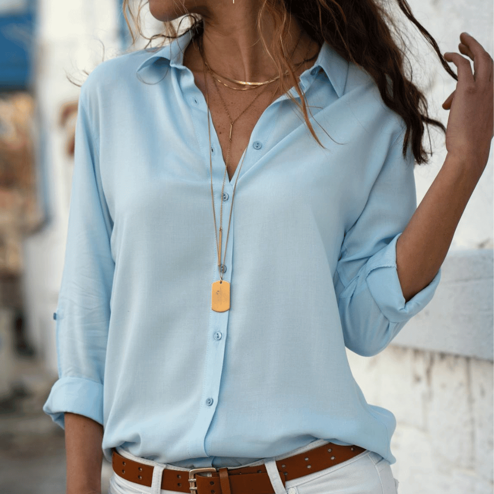 "Elegant dam långärmad blus i polyester, blå färg, med detaljerat snitt och lätt material, perfekt för alla tillfällen."