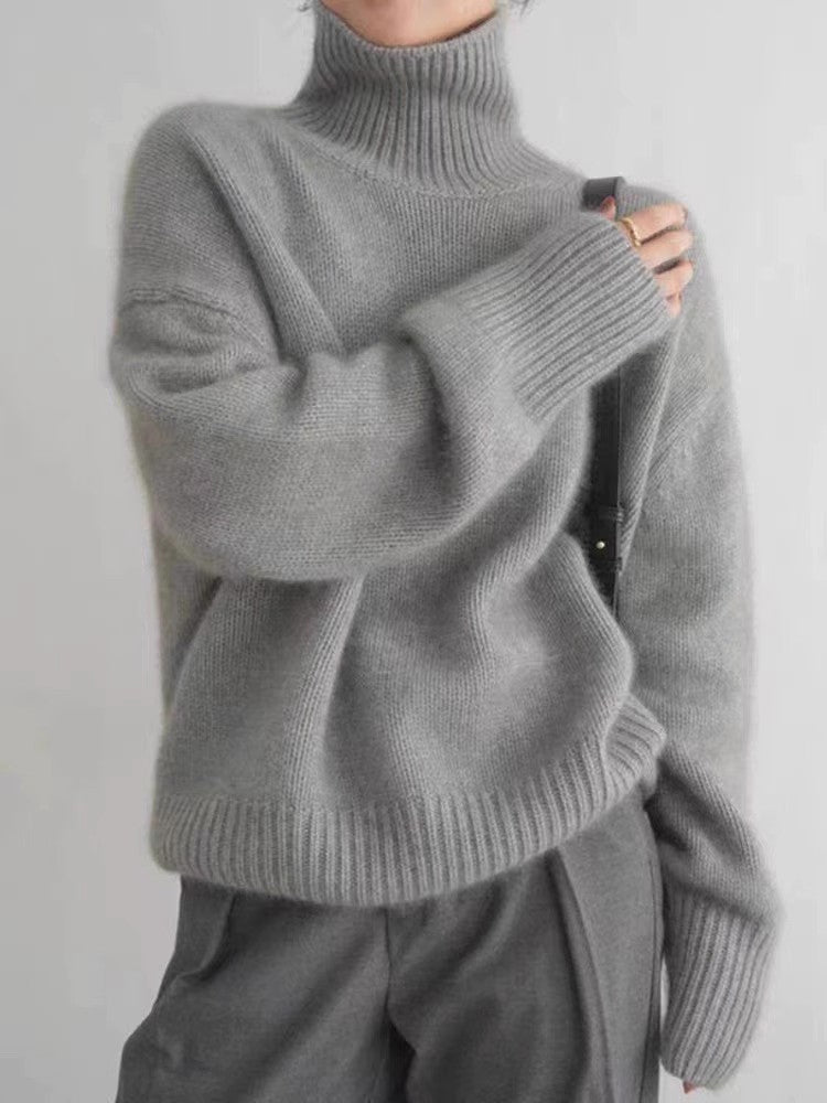"Elegant dam rollkragenpullover i mjuk kaschmir, idealisk för höst och vinter, erbjuder både stil och värme i flera färger."