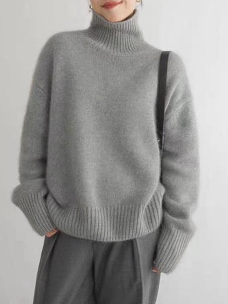 "Elegant dam rollkragenpullover i mjuk kaschmir, idealisk för höst och vinter, erbjuder både stil och värme i flera färger."