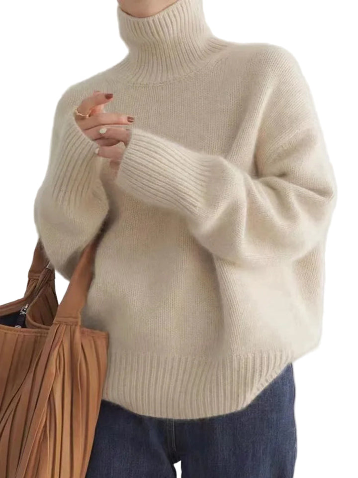 "Elegant dam rollkragenpullover i mjuk kaschmir, idealisk för höst och vinter, erbjuder både stil och värme i flera färger."