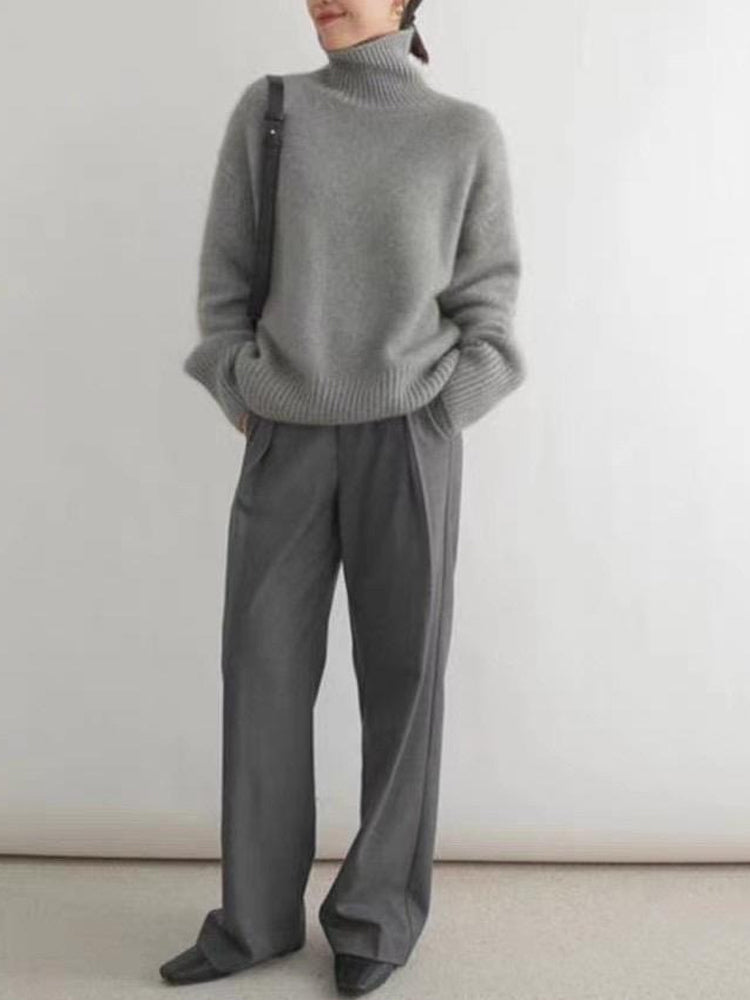 "Elegant dam rollkragenpullover i mjuk kaschmir, idealisk för höst och vinter, erbjuder både stil och värme i flera färger."