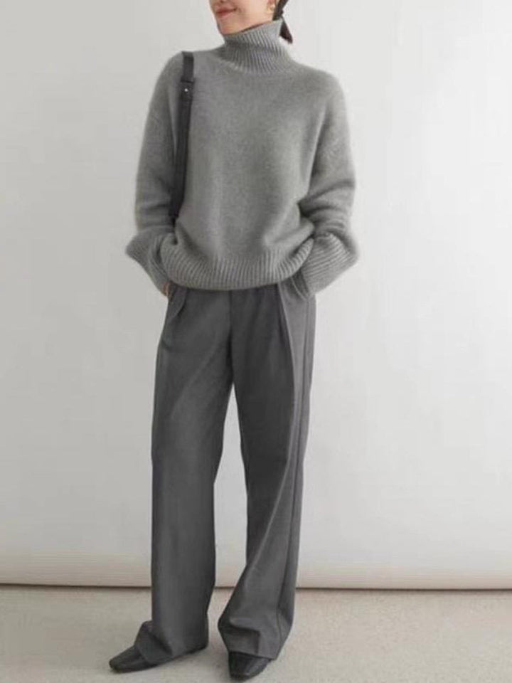 "Elegant dam rollkragenpullover i mjuk kaschmir, idealisk för höst och vinter, erbjuder både stil och värme i flera färger."
