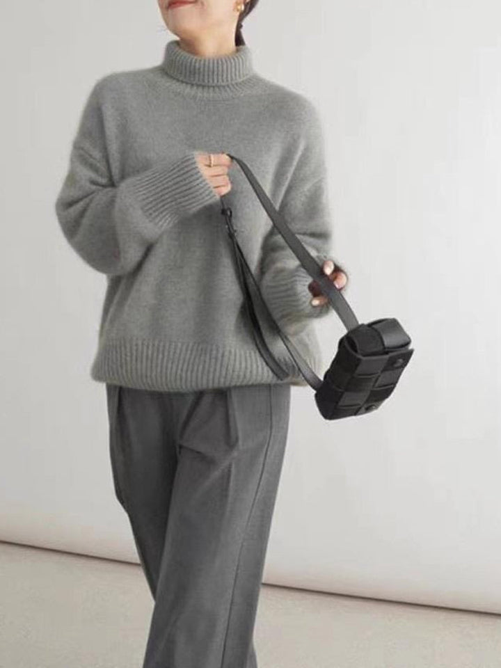 "Elegant dam rollkragenpullover i mjuk kaschmir, idealisk för höst och vinter, erbjuder både stil och värme i flera färger."