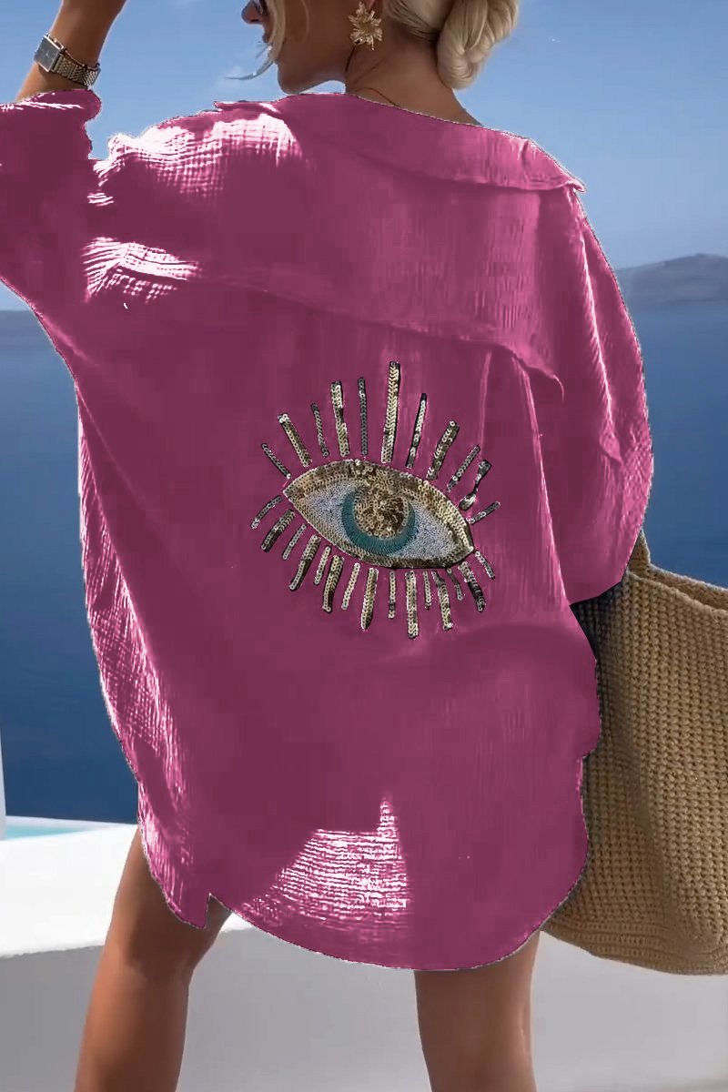 "Elegant dam t-shirt med alziend öga, mjuk textur, konstnärlig design. Perfekt för både vardag och fest."