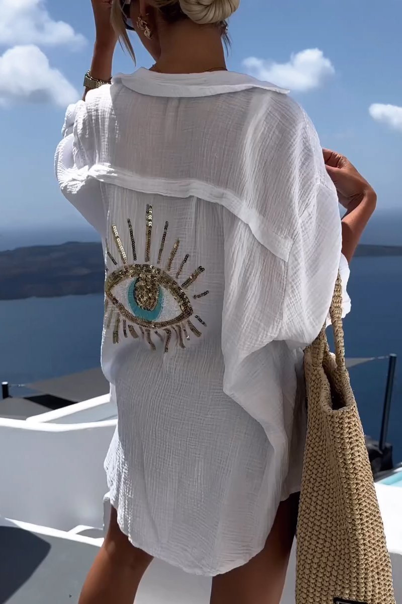 "Elegant dam t-shirt med alziend öga, mjuk textur, konstnärlig design. Perfekt för både vardag och fest."
