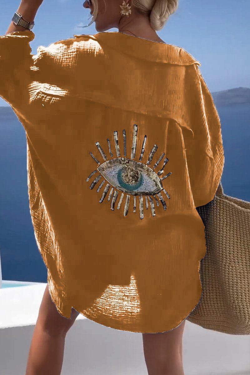 "Elegant dam t-shirt med alziend öga, mjuk textur, konstnärlig design. Perfekt för både vardag och fest."