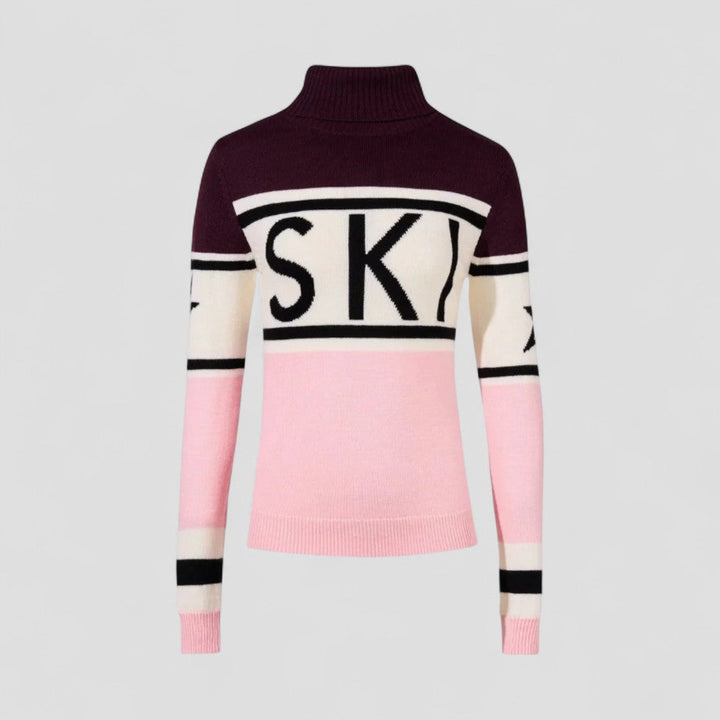 "Elegant dam turtleneck i merinoull med unik modern grafik, perfekt för vinterstil och avslappnad stadsvardag."