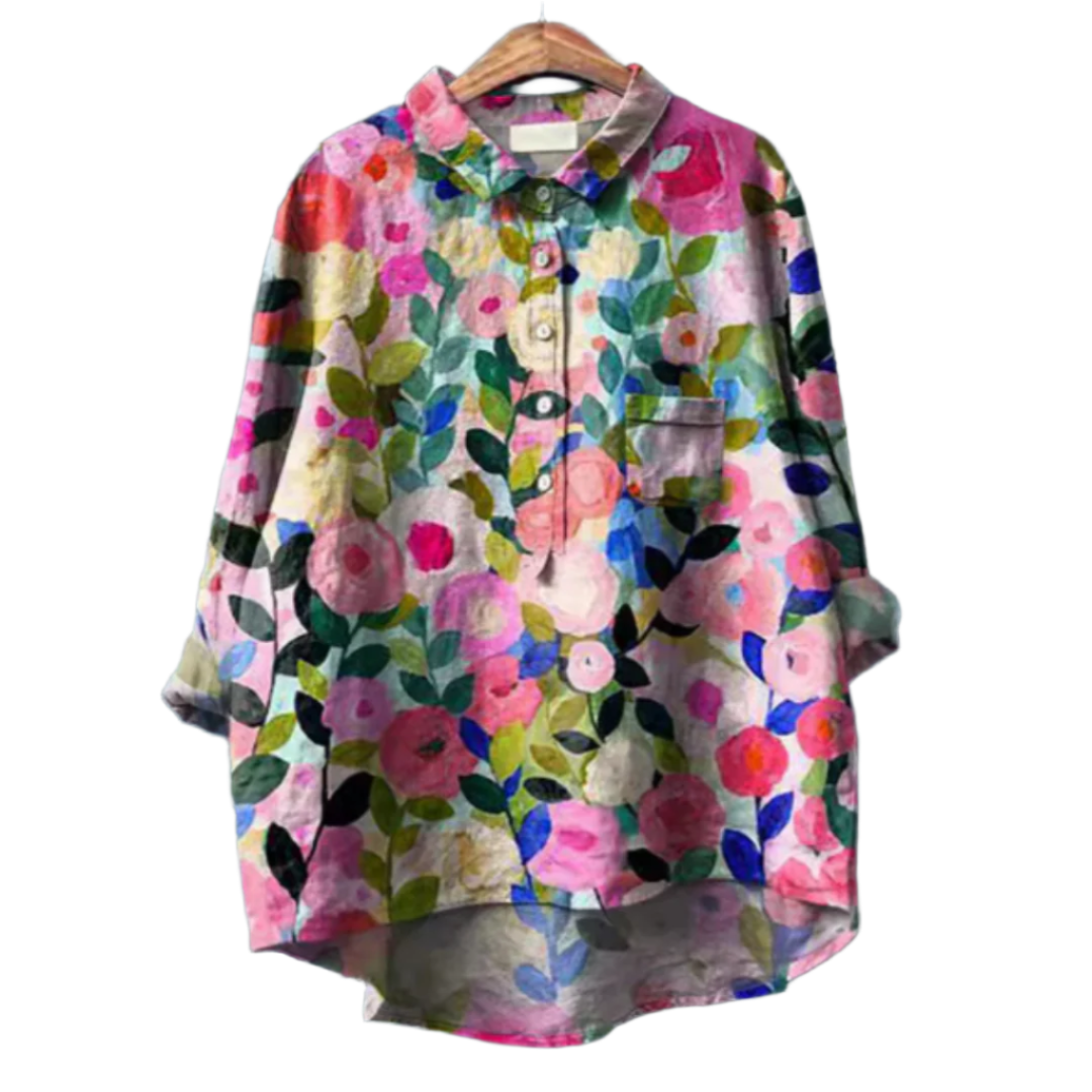 "Elegant damblus med färgglatt blomtryck, luftig passform och chic sommarstil för stilmedvetna kvinnor."