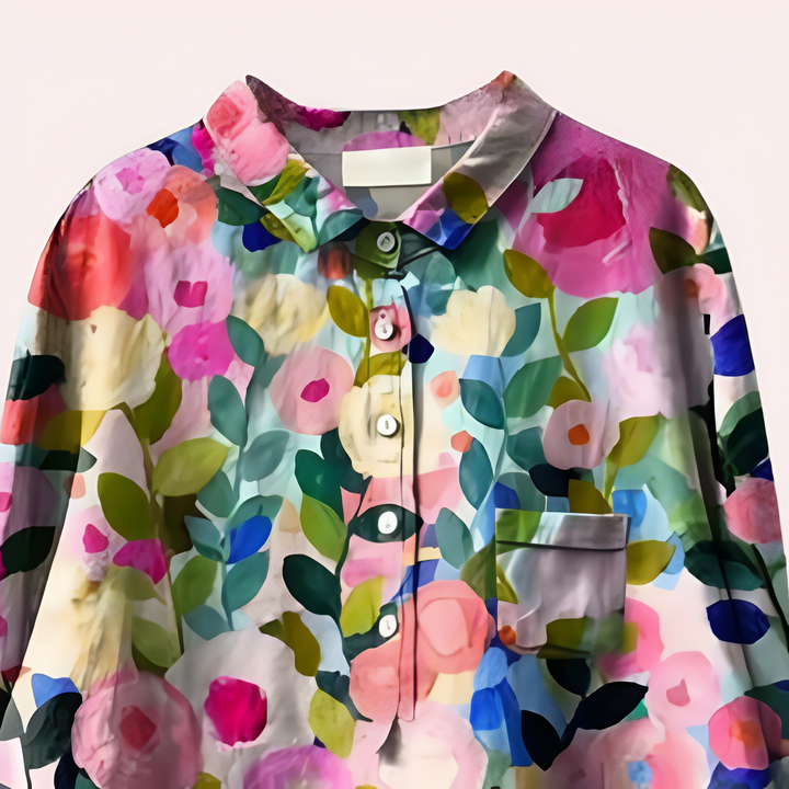 "Elegant damblus med färgglatt blomtryck, luftig passform och chic sommarstil för stilmedvetna kvinnor."