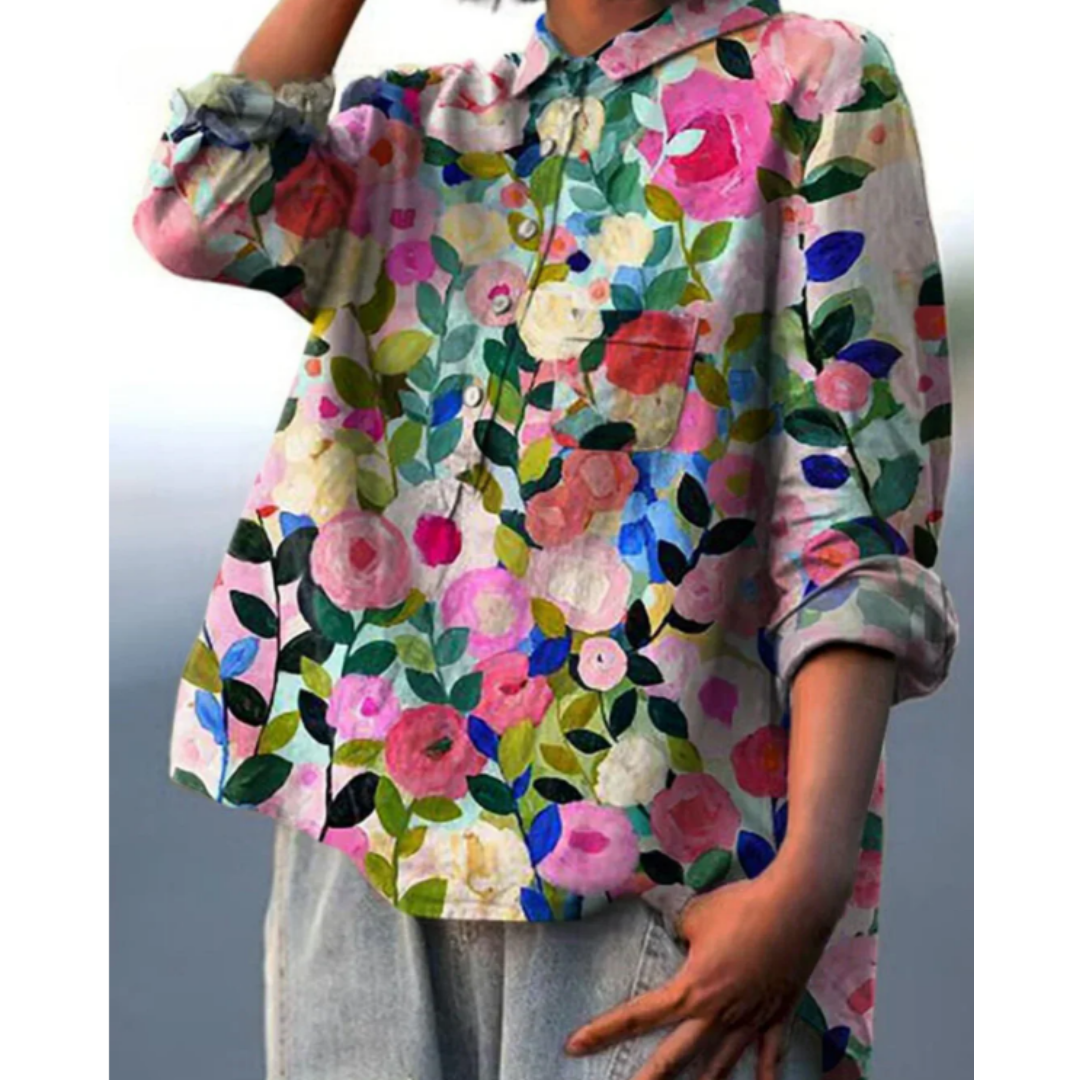 "Elegant damblus med färgglatt blomtryck, luftig passform och chic sommarstil för stilmedvetna kvinnor."