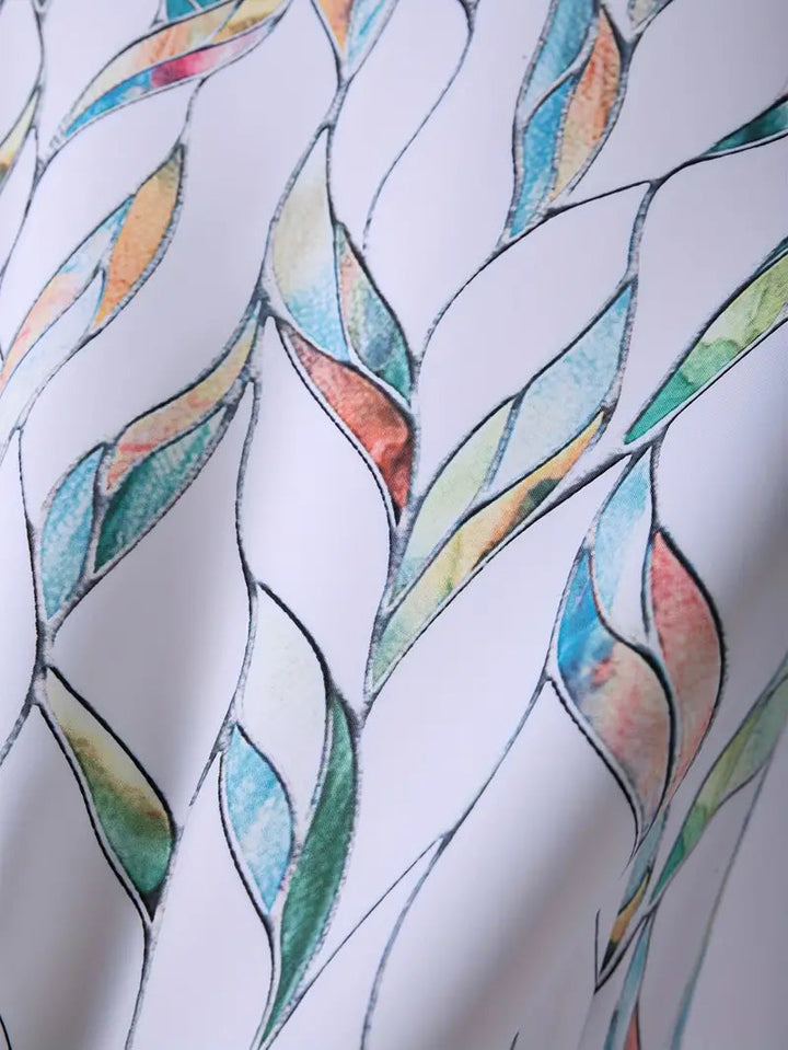 "Elegant damblus med unikt mönster, andningsbart material; idealisk för både casual och formella tillfällen."