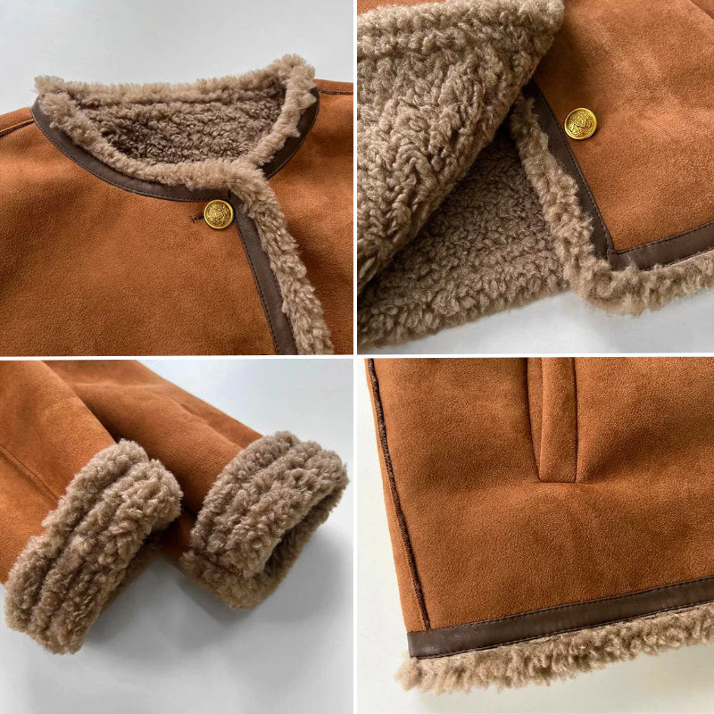 "Elegant damens shearling jacka med knäppning, varm och stilfull för vinterdagar, med sidofickor och detaljrik design."