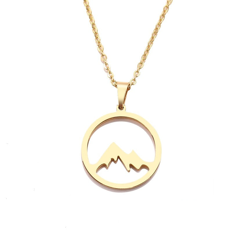 "Elegant damhalsband med bergshänge i rostfritt stål, myntformat, två snöiga bergstoppar, symbol för styrka och mod."