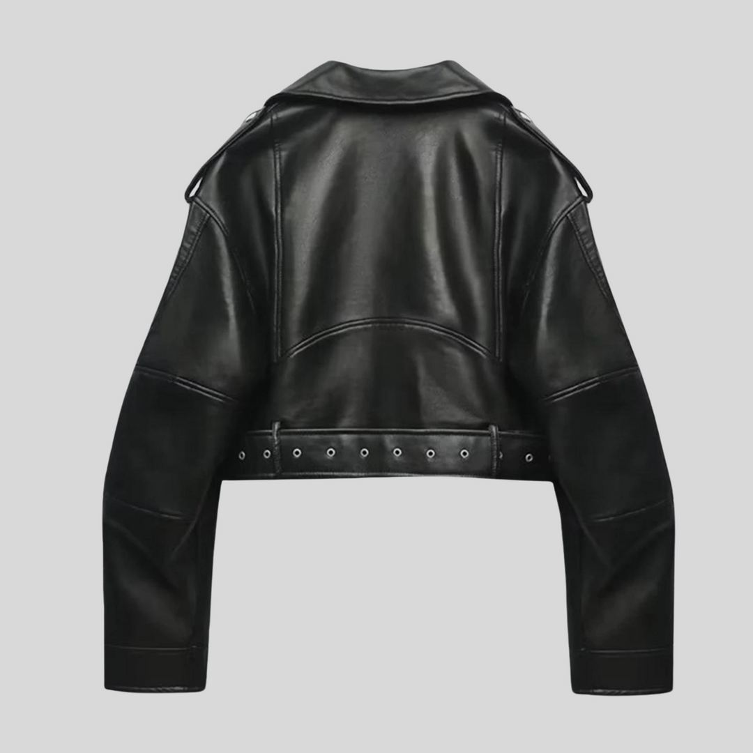 "Elegant damjacka med stilren design i mörk färg, visad framifrån för vardagsbruk med modern skärning och praktiska detaljer.
