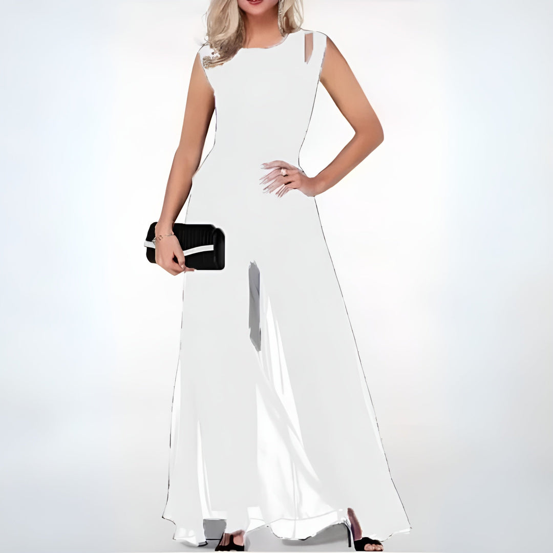 "Elegant damklänning med midjebälte i tidlös stil, skapar smickrande silhouette, perfekt för vardag och fest."