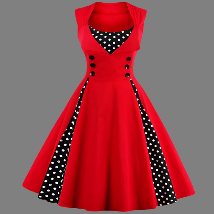 Elegant damklänning med röda polkadots, vintage stil. Smickrande passform, perfekt för både formella och semi-informella till