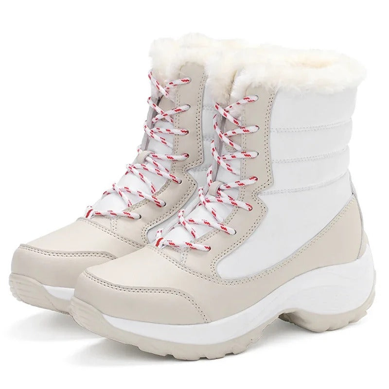 "Elegant damsnökänga i mikrofiber med vattenresistent foder, kilklack och snörning för vinteräventyr och mode."