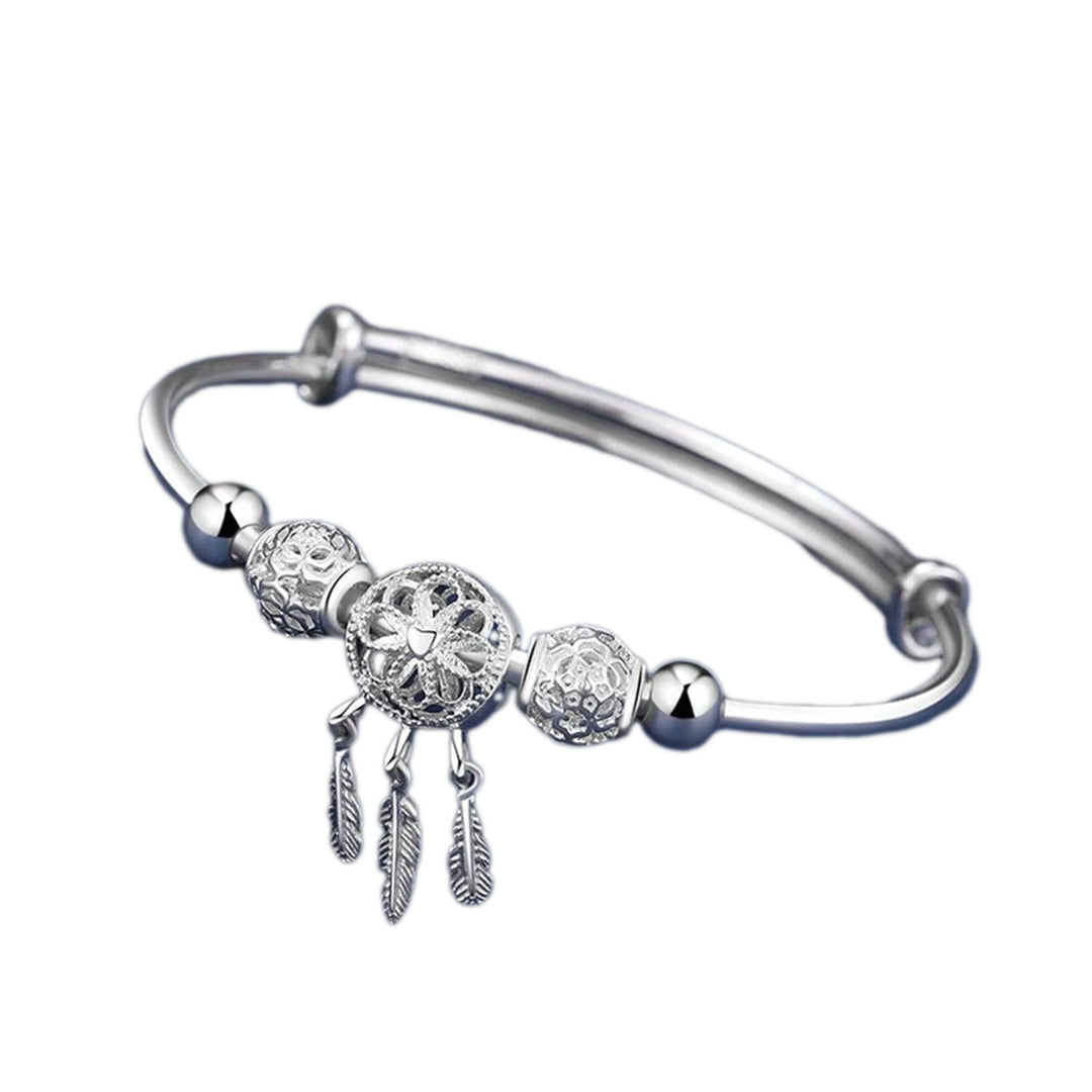 "Elegant drömfångare armband i sterling silver, justerbar passform med intrikat design för kvinnor."