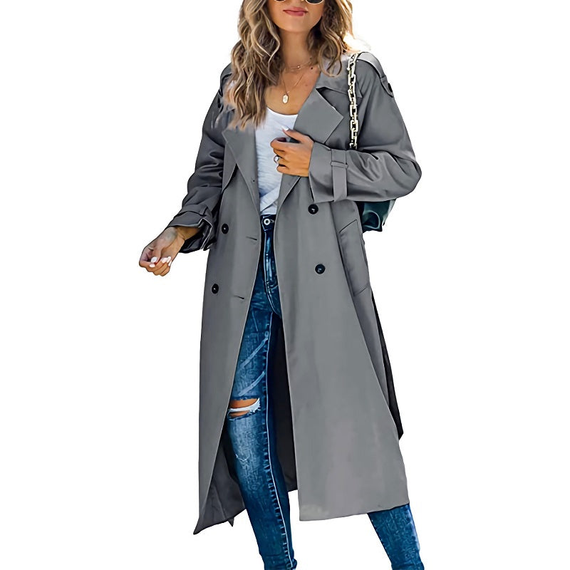 Elegant dubbelknäppt trenchcoat för kvinnor, lång och stilren design, perfekt för alla tillfällen.