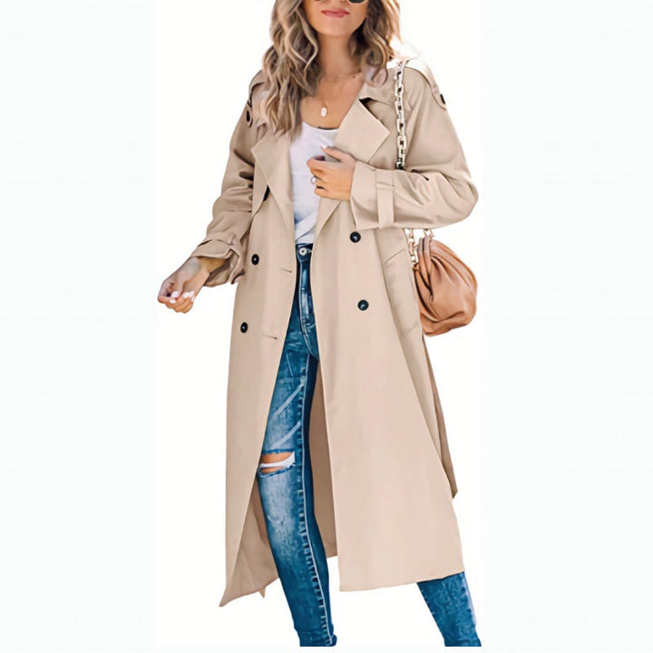 Elegant dubbelknäppt trenchcoat för kvinnor, lång och stilren design, perfekt för alla tillfällen.
