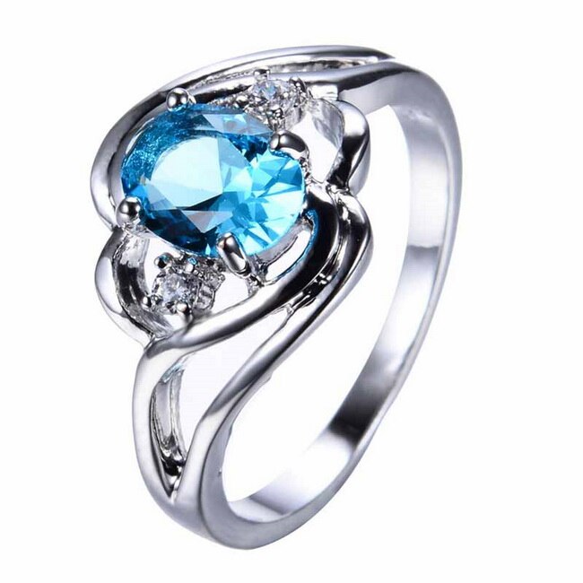 "Elegant födelsesten ring med oval sten & cubic zirconia, perfekt för kvinnor, vardag & festliga tillfällen, i blå och röd."