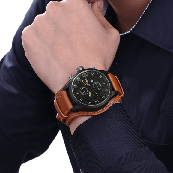 "Elegant herrklocka med brun läderrem och vattentålighet, klassisk design för stil och precision."