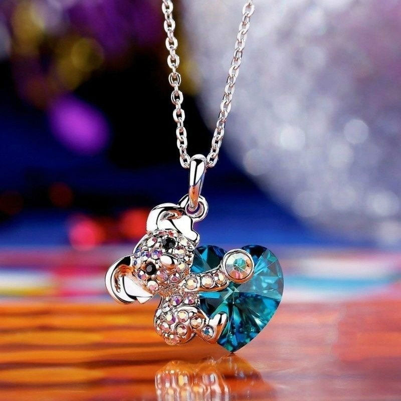 "Elegant koalabjörn halsband för kvinnor, blått hjärta av Swarovski-kristaller, detaljrikt design, smyckestillbehör."