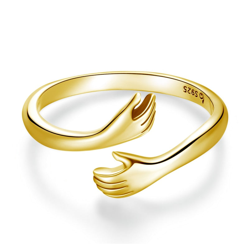 "Elegant kärlek kramring i justerbart silver med textdesign, idealisk för kvinnliga accessoarer och symbol för närhet."