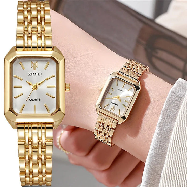 Elegant kvadratisk kvinnoarmbandsklocka i guld och silver med fyrkantig urtavla och glänsande metallarmband.