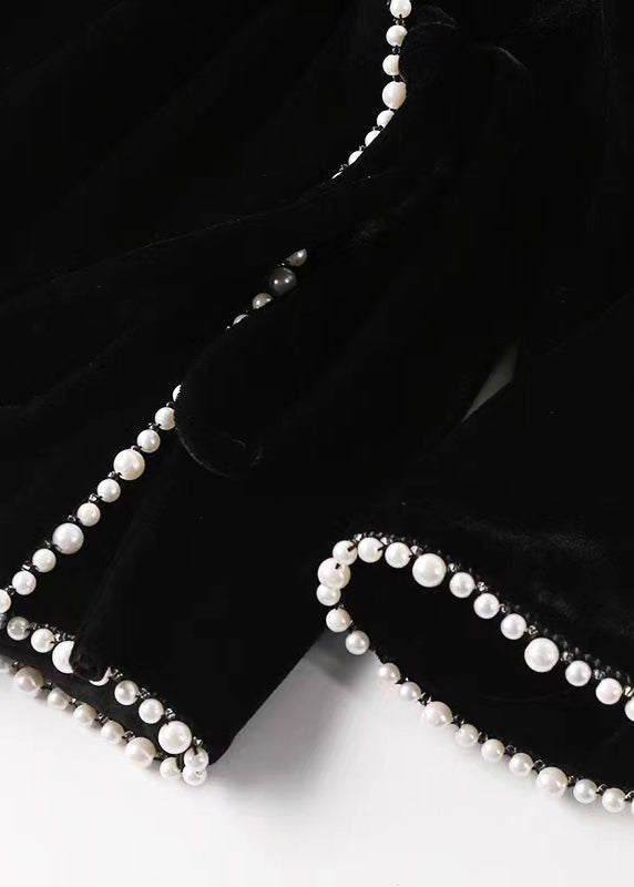 "Elegant kvinnor fest topp med pärldetaljer, patchwork-mönster och O-hals, perfekt kombination av stil och komfort."