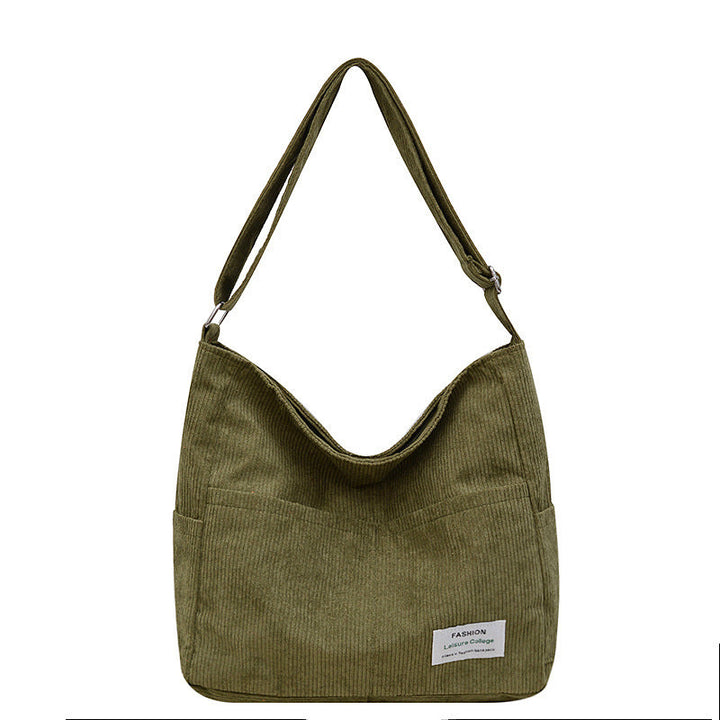 Elegant kvinnors axelväska i textil, justerbar rem, flera fickor, finns i beige, brun, grå, grön, svart.