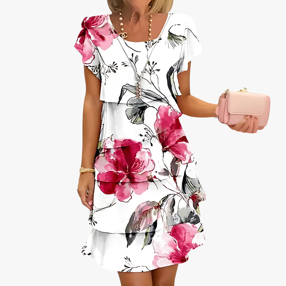 Elegant maxiklänning med blommönster, flödande design. Perfekt för alla tillfällen. Maximal bekvämlighet och stil.