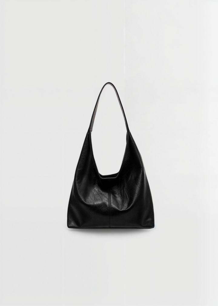"Elegant vintage damväska i PU-läder, med rymlig insida och komfortabla handtag, perfekt för daglig användning."