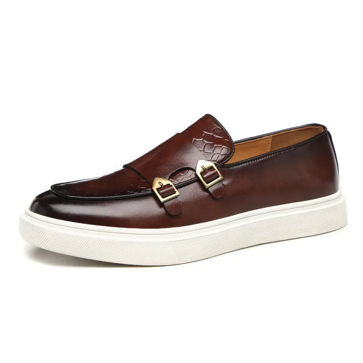 "Eleganta herrloafers i konstläder med ormskinnsmönster, brun och svart, stilfull design för formella och lediga tillfällen."