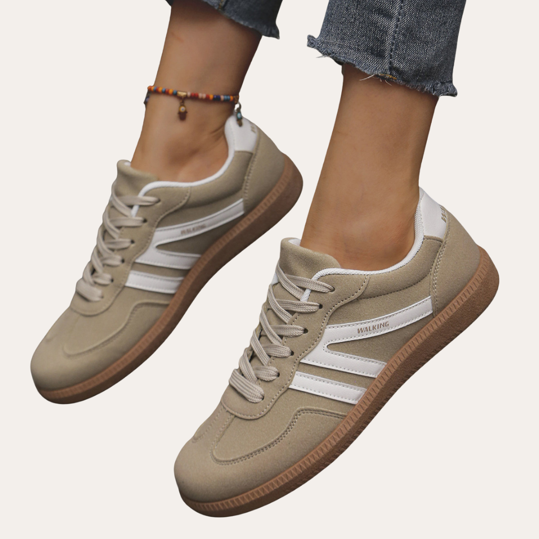 Eleganta kvinnors sneakers med fotvalvsstöd, komfortsula och hållbart läder för stil och vardagskomfort.