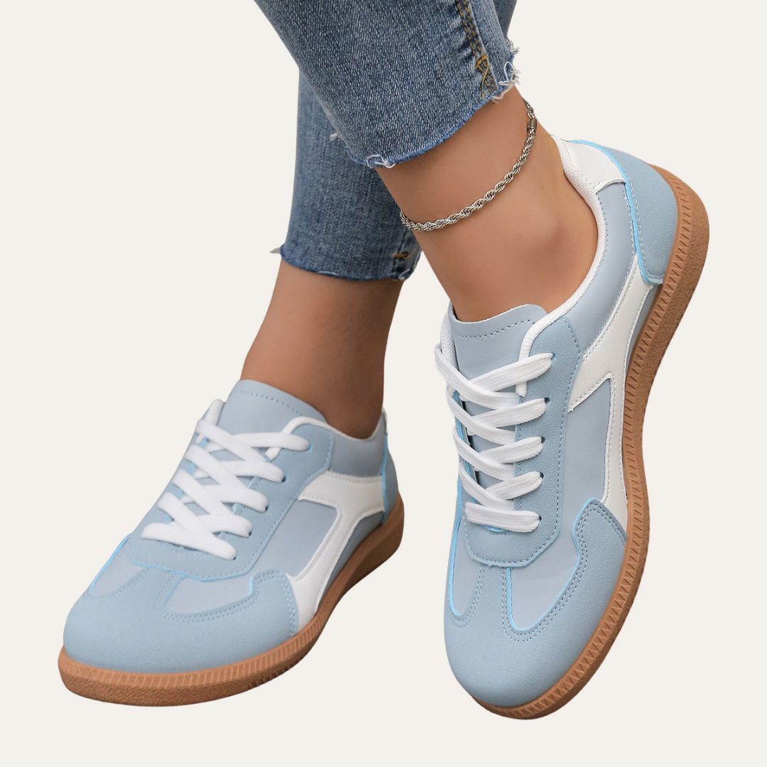 Eleganta kvinnors sneakers med fotvalvsstöd, komfortsula och hållbart läder för stil och vardagskomfort.