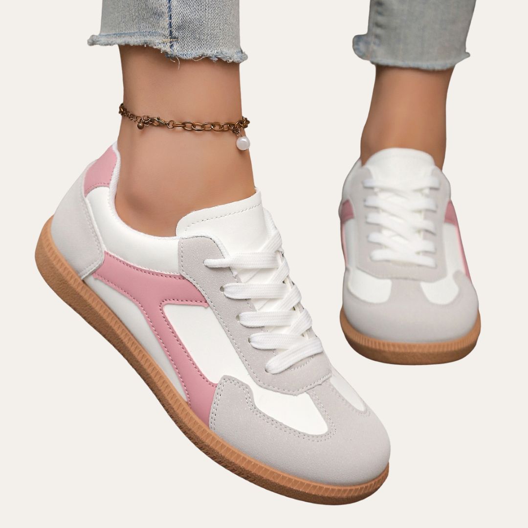 Eleganta kvinnors sneakers med fotvalvsstöd, komfortsula och hållbart läder för stil och vardagskomfort.