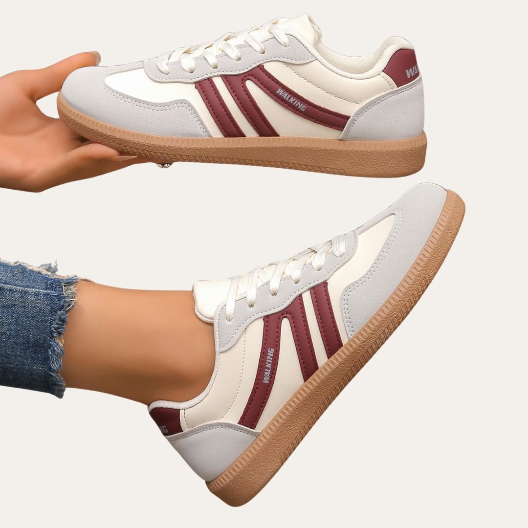 Eleganta kvinnors sneakers med fotvalvsstöd, komfortsula och hållbart läder för stil och vardagskomfort.