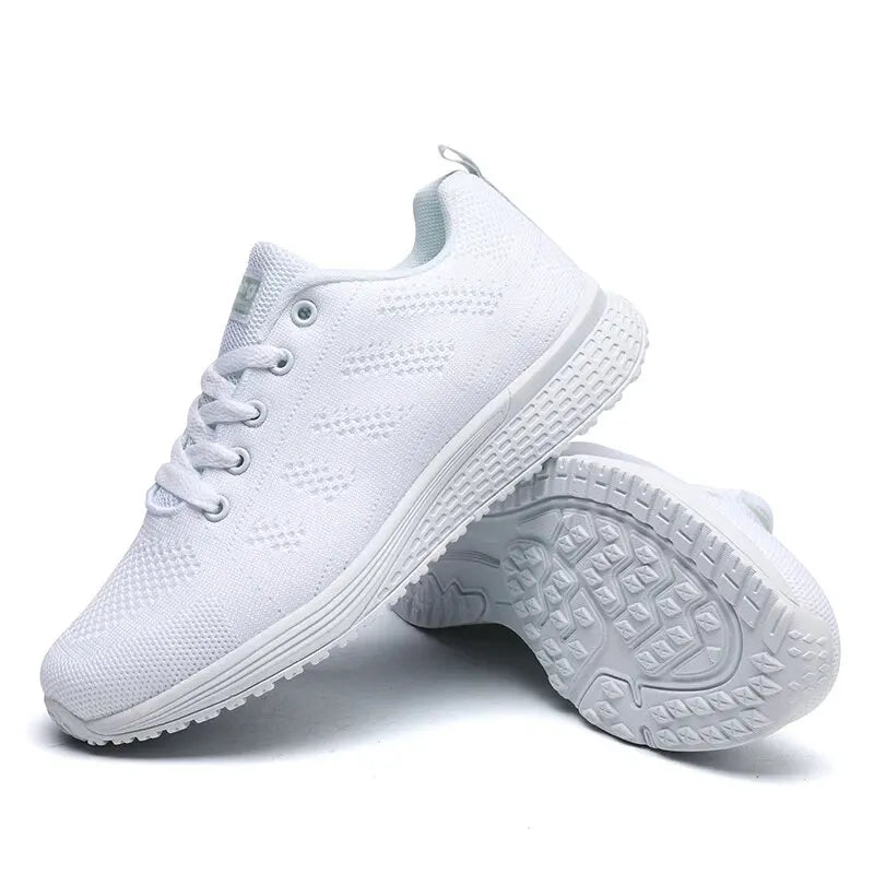 "Eleganta vita kvinnors sneakers med ventilerande mesh för stil och komfort året runt."