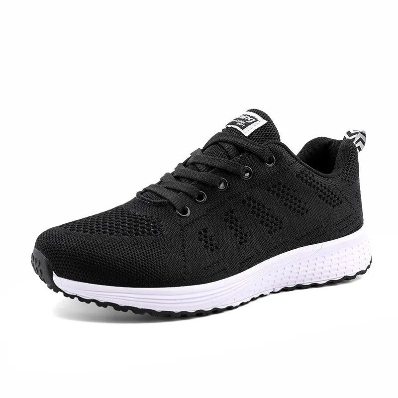 "Eleganta vita kvinnors sneakers med ventilerande mesh för stil och komfort året runt."