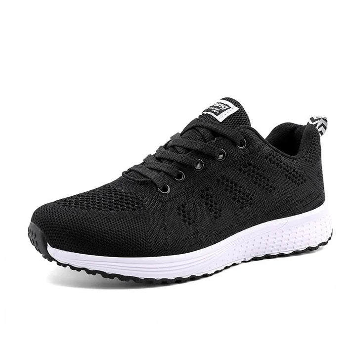 "Eleganta vita kvinnors sneakers med ventilerande mesh för stil och komfort året runt."
