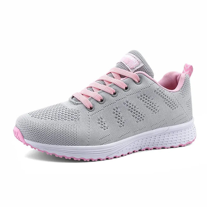 "Eleganta vita kvinnors sneakers med ventilerande mesh för stil och komfort året runt."