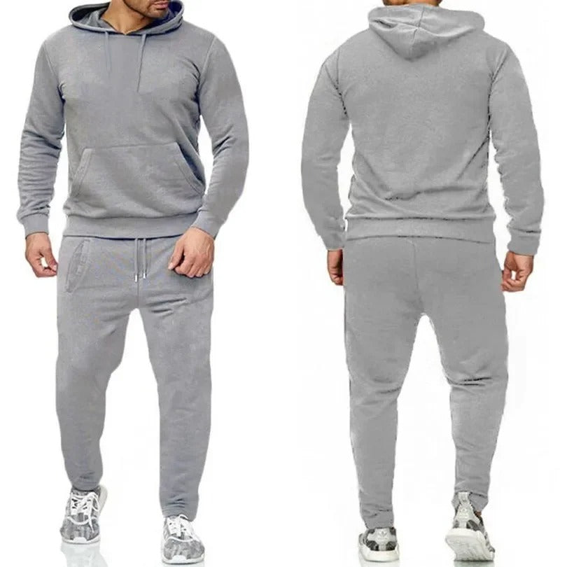 "Fitness Hoodie Set för Män, andningsbar och flexibel, huvtröja och joggingbyxor, grå färg, sportig design."