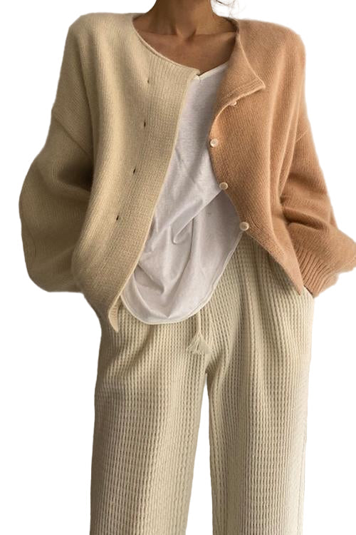 Färgglad damtröja med lång ärm och drop shoulder-design i livfulla nyanser för modern och avslappnad stil.