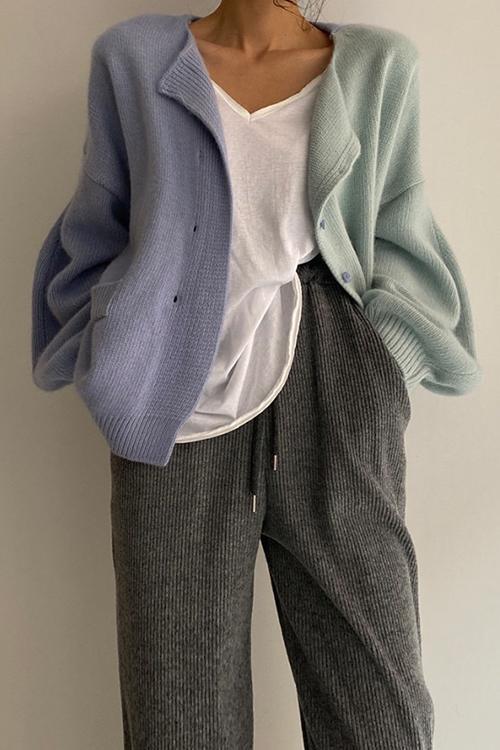 Färgglad damtröja med lång ärm och drop shoulder-design i livfulla nyanser för modern och avslappnad stil.