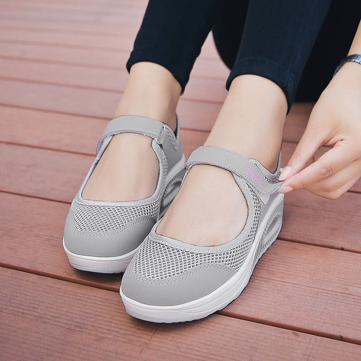 "Färgglada dam-modesneakers, andningsbara med ortopedisk fjädersula, perfekt för komfort och stil."