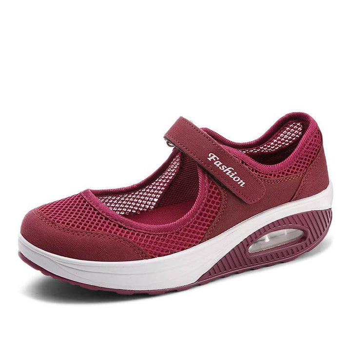"Färgglada dam-modesneakers, andningsbara med ortopedisk fjädersula, perfekt för komfort och stil."