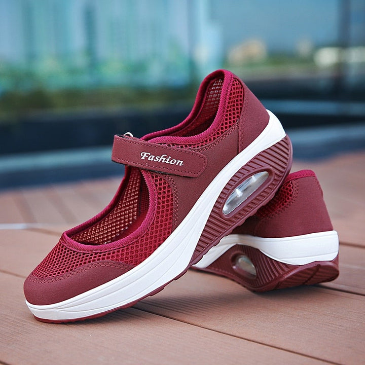 "Färgglada dam-modesneakers, andningsbara med ortopedisk fjädersula, perfekt för komfort och stil."